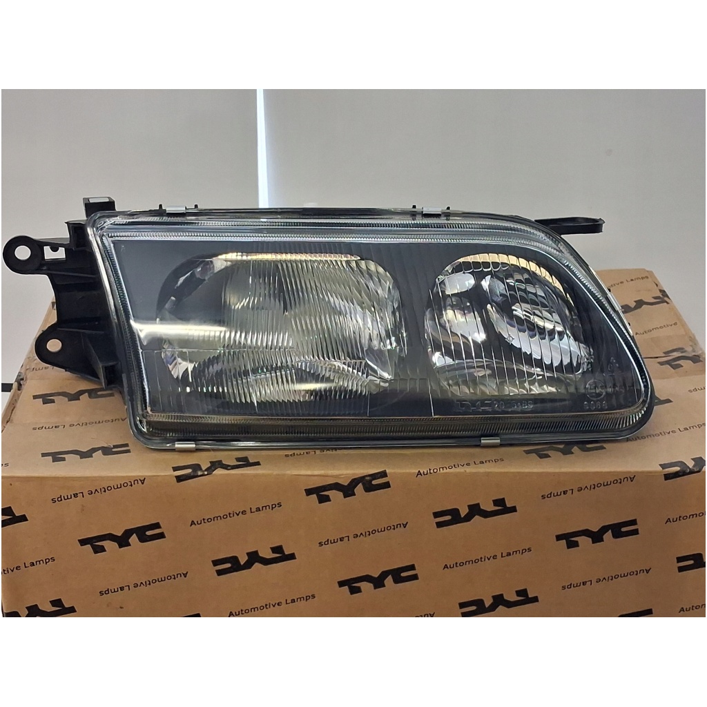 TYC 20-5489-08-2 Reflektor Mazda 626 1997–2000 H7+H1 EL GE4T51030D